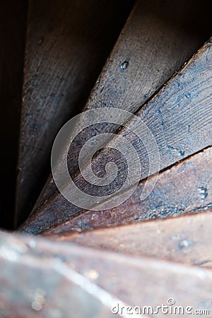 Old vintage tudor stairway spiral wooden shaped stairs interior feature viewed from above Stock Photo