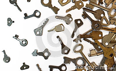 Old vintage various keys pattern. Antique metal gold bronze silver color different clue for padlock. Chaotically mix Stock Photo