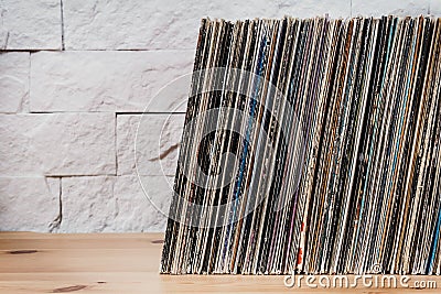 Old Vinyl records in the wooden shelf Stock Photo