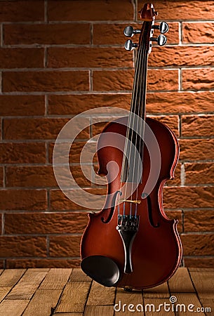 Old violin on table Stock Photo