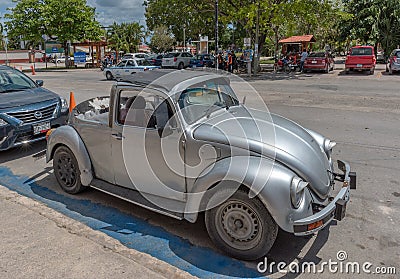 Old Volkswagen Beetle Cabriolet on the roadside, Bacalar, Mexico Editorial Stock Photo