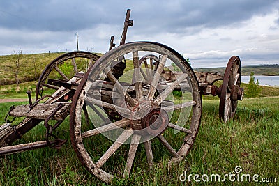 Old wagon on a field Stock Photo