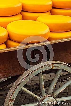 Old wagon filled with Dutch cheese Stock Photo