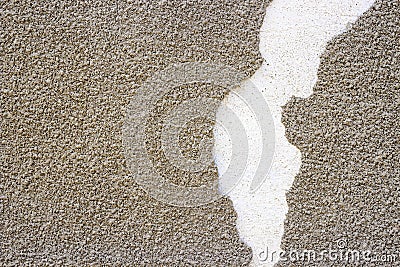 Old wall with damaged plaster layer. Gray Brick Mortar Wall With Rough Shabby Stucco Layer Texture. Renovation Concept. B Stock Photo