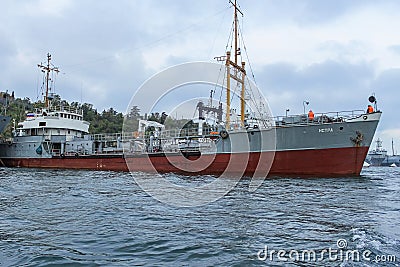 Old warship of the Russian Navy in the port of Sevastopol Editorial Stock Photo