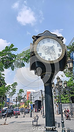 Old Watch in Old City Place Editorial Stock Photo