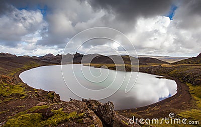 Old Water Filled Crater Stock Photo