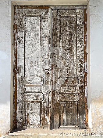 Old weathered antique door as a vintage background. Stock Photo