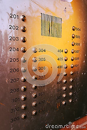 Old weathered intercom button panel Stock Photo