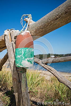 Old weathered lobster buoy Stock Photo