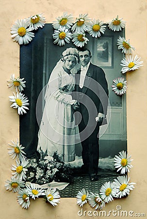 Old wedding photo with daisies Stock Photo