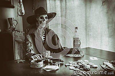 Old West Poker Skeleton Stock Photo