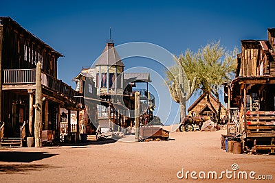 Old Western Wooden Buildings in Goldfield Gold Mine Ghost Town in Youngsberg, Arizona, USA Stock Photo