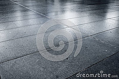 Old wet stone paved avenue street road Stock Photo