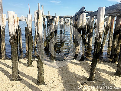 Old wharf, seascape, beach and sea Editorial Stock Photo