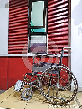 old whell chair in front of hospital Stock Photo