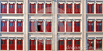 White building and red windows in classic colonial architecture buildings in singapore china town Stock Photo
