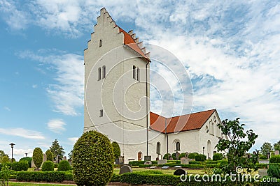 Old white church in Skurup in southern Sweden Stock Photo