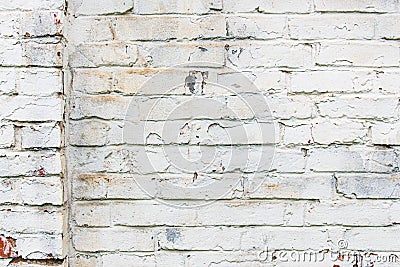 Old whitewashed brick wall, cracked and dirty. White color design background Stock Photo