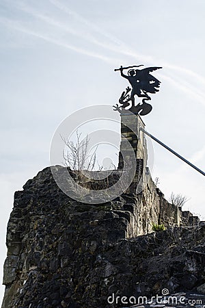 Old wind vane as an angel with the sword Stock Photo