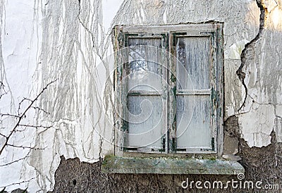Old window in an abandoned house Stock Photo