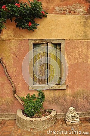 Old window of ancient house in torcello island Stock Photo