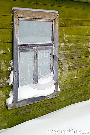 The old window brought by a snow Stock Photo