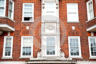 old window in europe london red brick wall historical Stock Photo