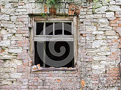 Old window in a forgotten home Stock Photo