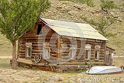 Old Woden house in green mountains Stock Photo