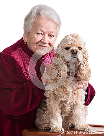 Old woman with american cocker spaniel Stock Photo