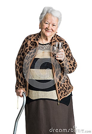 Old woman with glass of water Stock Photo