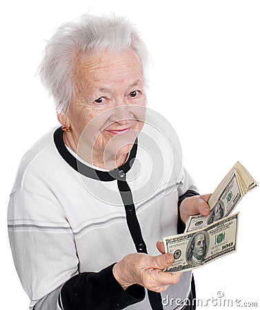 Old woman holding money in hands Stock Photo