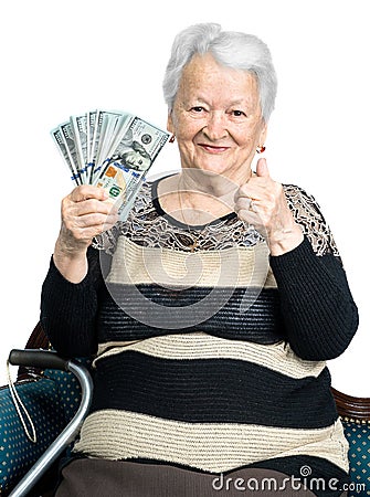 Old woman holding money in hands Stock Photo