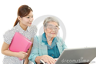 Old woman with a notebook Stock Photo