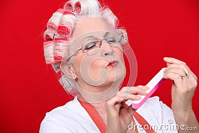 Old woman in rollers Stock Photo