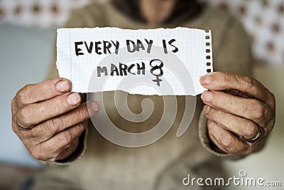 Old woman and text every day is march 8 Stock Photo