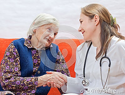 Old woman and the young doctor Stock Photo