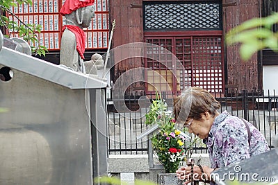 Old women respect belief by beautiful mind,Toji temple. Editorial Stock Photo