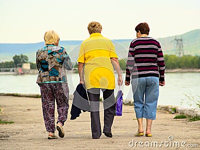 Old women walk along the embankment Editorial Stock Photo