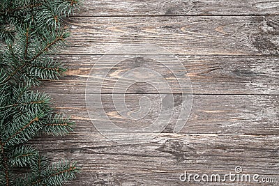 Old wood background with fir branches. Space for a greeting message. Christmas card. Top view Stock Photo