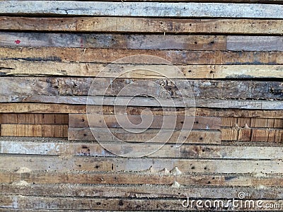 Old wood plank pile with termites eat wood . Stock Photo