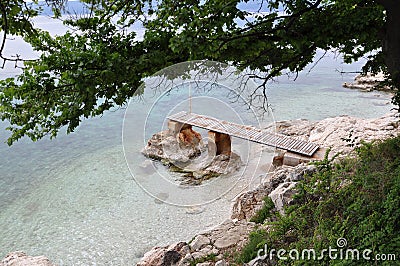 Old wooden abandoned pier in Adriatic Sea Stock Photo