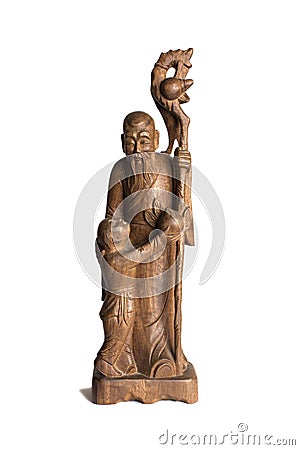 Old wooden asian statuettes Stock Photo