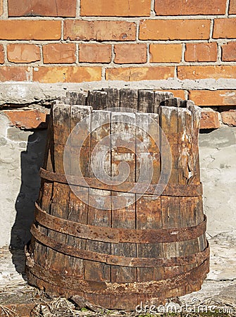 Old wooden barrel with ferruginous rings Stock Photo