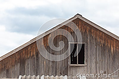 Old wooden boards on the roof of the house Stock Photo