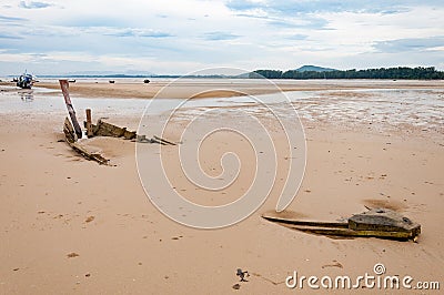 Old wooden boat wreck on the beach Stock Photo