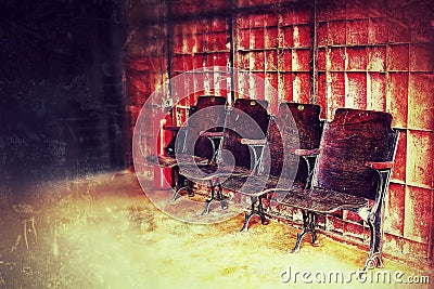 Old wooden chair In the old ired ron wall interior Vintage Stock Photo