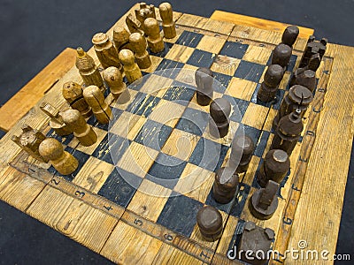 Old wooden chessboard Stock Photo