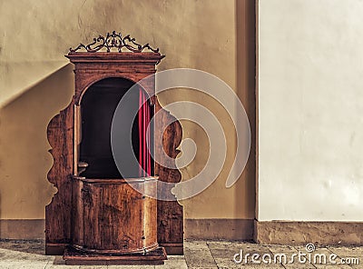 Old wooden confessional Stock Photo